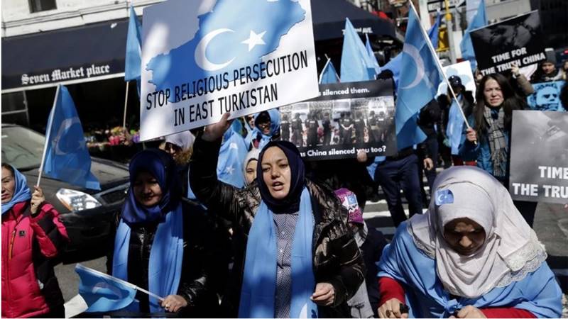 Uighurs and their supporters Protest in March in NY
