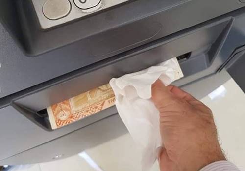 Precautionary measures ATM Machine Coronavirus Masks Gloves