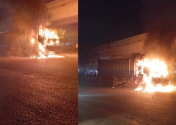 Dumper Hits Biker, Mob Torches truck at Nagan Chowrangi