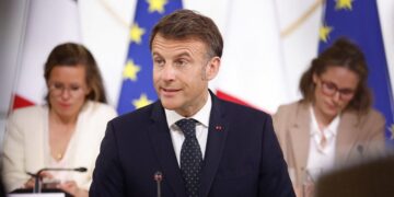President Macron Urges European Firms to Halt U.S. Investments